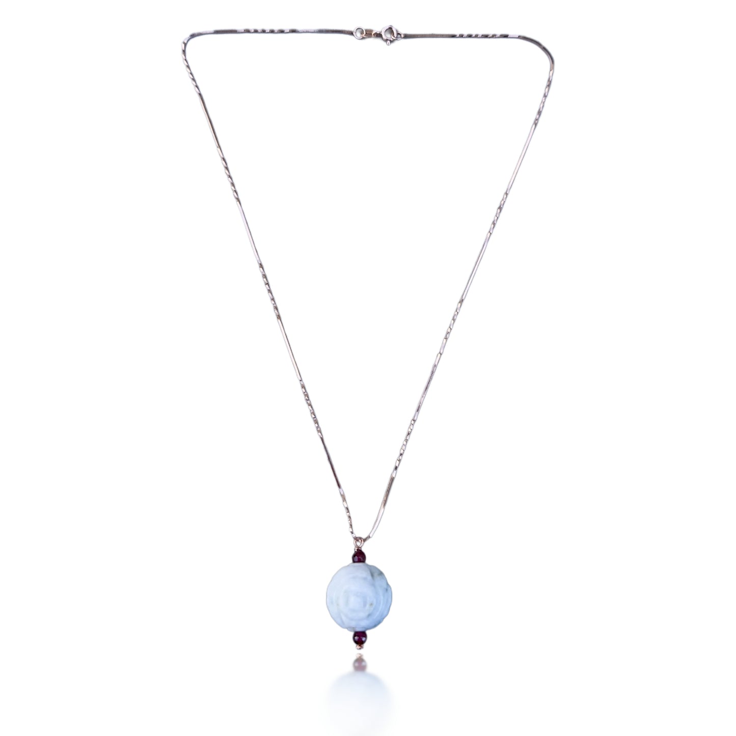 Abundance pendant with Burma jade carving and garnet