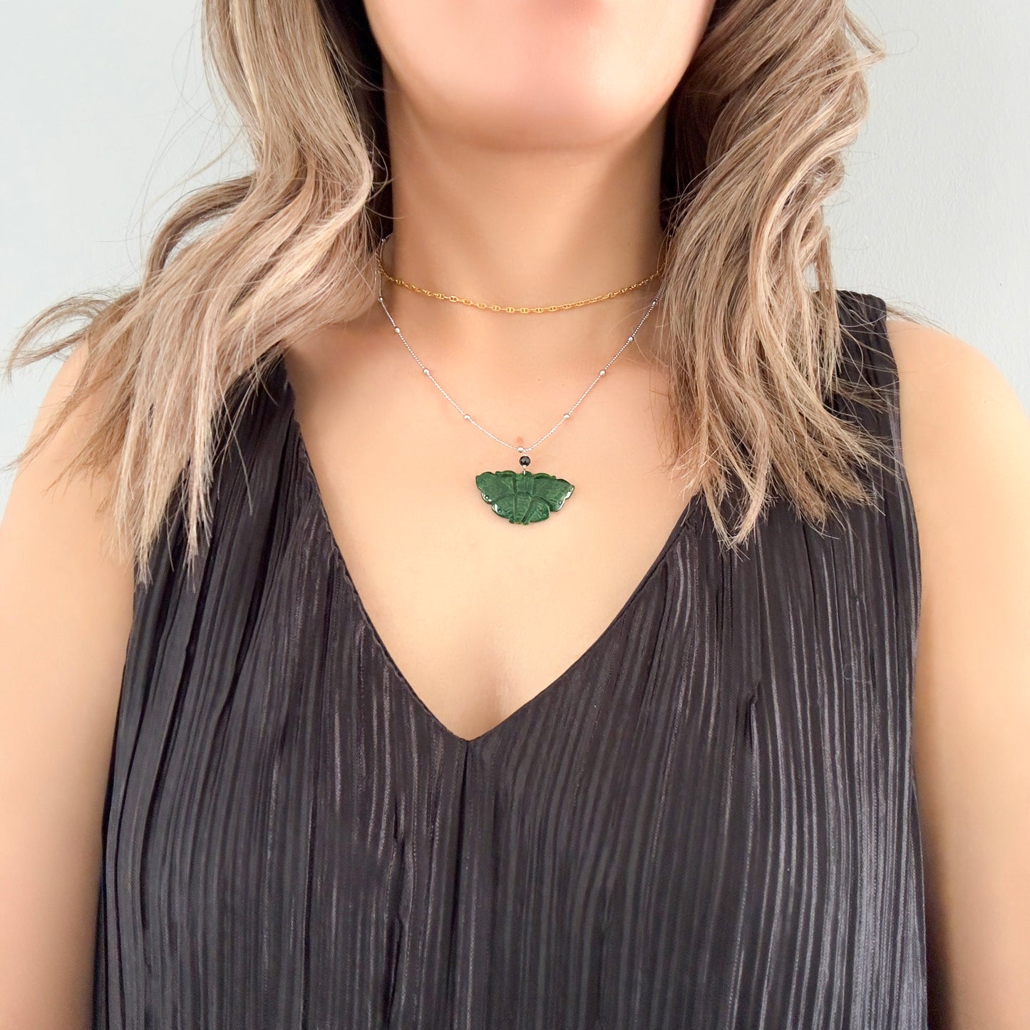 Abundance pendant with jade butterfly carving and black spinel